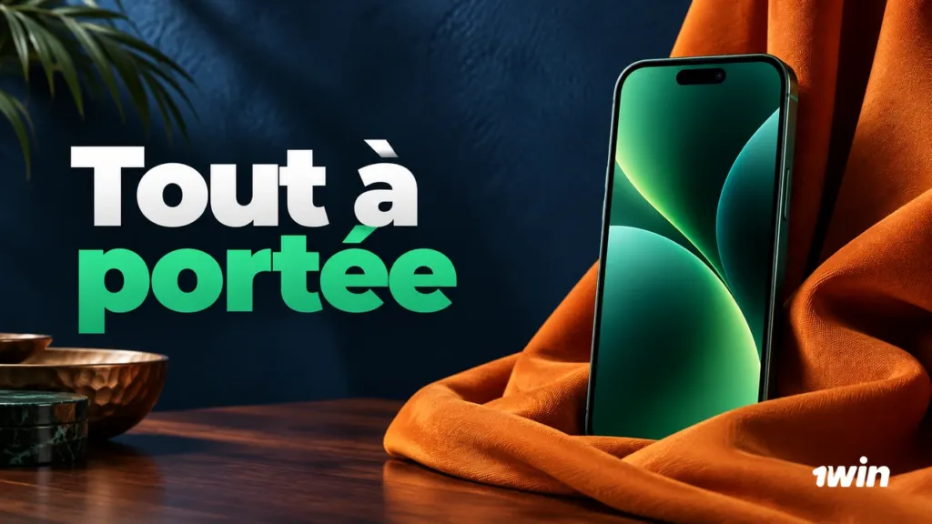 Téléphone vert posé sur un tissu orange.